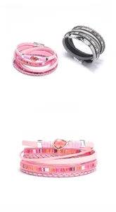 Detail of multi-layer bohemian leather wrap bracelet with teardrop crystal and magnetic clasp