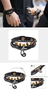 Détail d'un bracelet en cuir multicouche avec pendentif Tai Chi et perles en bois