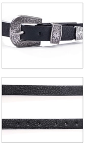 Détails de la boucle en métal argenté ciselé et de la texture du cuir noir vintage