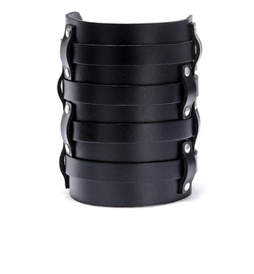 Detailed view of black cowhide punk wristband featuring multiple layers and metal rivets