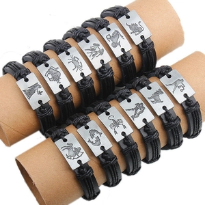 Set di Braccialetti in Pelle Intrecciata a Mano 12 Segni Zodiacali per Uomo Donna Bracciale Avvolgente Punk con Ciondolo a Costellazione