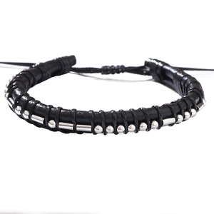Men's leather braided bracelet with Morse code stainless steel beads on white background