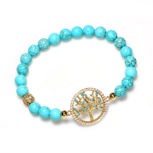 Bracelet en perles turquoise avec pendentif Arbre de Vie doré et détails en zircon