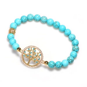 Bracelet perles turquoise avec pendentif arbre de vie doré et accents en zircon brillant