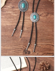Close-up of vintage Bolo Tie with turquoise inlay on textured dark wood background