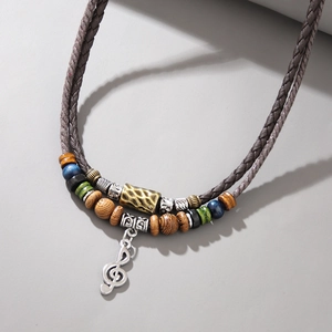 Vintage layered wood bead necklace with leather cord and silver music note pendant