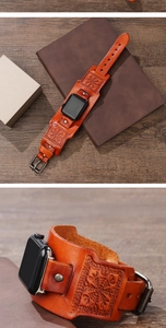 Macro view of vintage brown leather Apple Watch strap with Nordic embossed rune patterns
