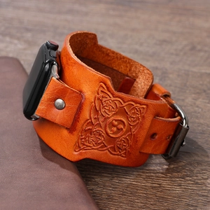 Vintage brown leather strap for Apple Watch with embossed Celtic knot and dark metal buckle
