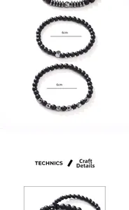 Macro shot of matte black beaded bracelets showing textured finish and 6cm inner diameter