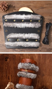 Viking style black leather arm guards with grey faux fur and gold rivets detail