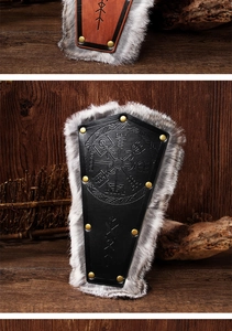 Close-up of Viking leather bracer with Vegvisir embossed symbol and faux fur trim