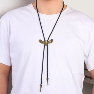 Men's vintage golden eagle bolo tie with black braided leather rope and metal tips