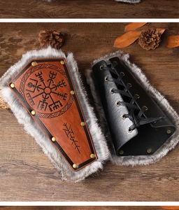 Detail of Viking bracers with faux fur lining and embossed Vegvísir compass symbols