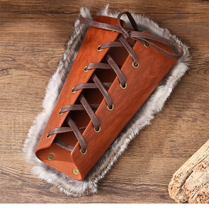 Detail of Viking bracer with brown faux leather texture and plush grey faux fur lining