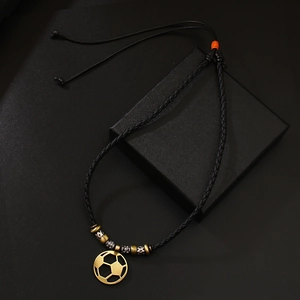 Adjustable leather cord necklace with a golden soccer ball pendant and vintage beads