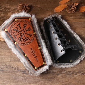 Viking style leather arm guards with Vegvisir embossed pattern and faux fur lining