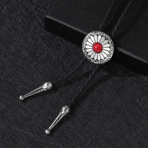 Retro American bolo tie with red gemstone sunflower pendant and black braided leather cord