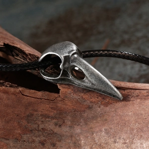 Gothic punk crow skull pendant necklace in antique silver finish with black cord