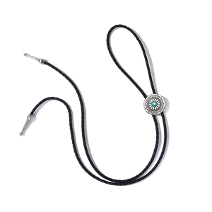 Vintage bolo tie with turquoise sunflower slide and black braided leather cord