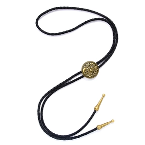 Vintage bronze sunflower bolo tie with black braided leather cord and metallic tips