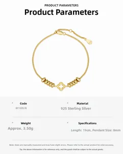 Macro detail of 925 sterling silver gold clover bracelet with polished beads and 19cm chain