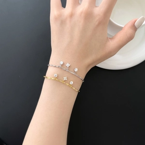 Elegant S925 sterling silver clover bracelets with zircon pendants in gold and silver finish