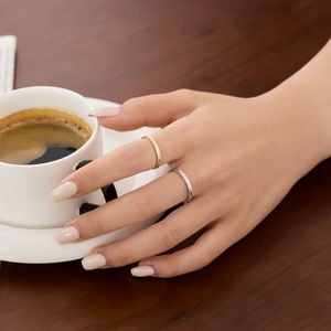 Close-up of gold and silver S925 rings with vintage fish scale texture for women