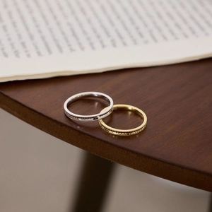 Elegant S925 sterling silver milgrain stacking rings in silver and gold finishes