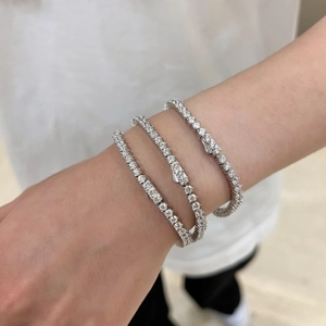 Detailed view of three 3mm S925 sterling silver tennis bracelets with cubic zirconia