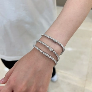 Detailed view of three-piece silver S925 tennis bracelets set with sparkling zircons