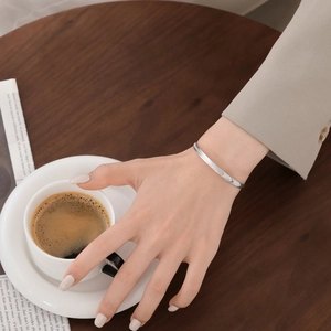Elegant S925 sterling silver wavy textured open cuff bracelet for women styling with a blazer