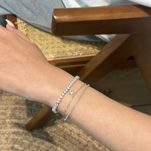 Three-piece S925 sterling silver chain bracelet set with zircon stones on model's wrist
