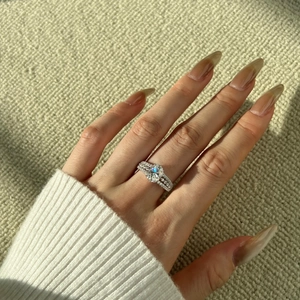 Elegant S925 sterling silver ring with 2ct round moissanite on three-layer band