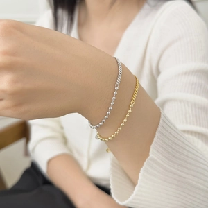 Detail of S925 sterling silver mixed chain bracelet with beads and invisible clasp