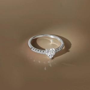 Elegant S925 sterling silver ring with 2-carat heart-shaped moissanite and side accents