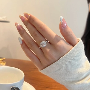 Exquisite S925 sterling silver halo engagement ring with 1.2 carat moissanite cushion cut