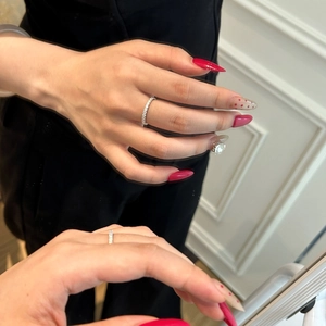 Sparkling S925 sterling silver band ring with full moissanite pavé setting on model finger