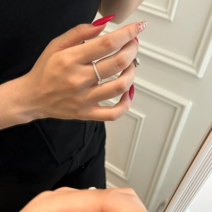 Sparkling S925 sterling silver eternity band ring with full moissanite stones on model