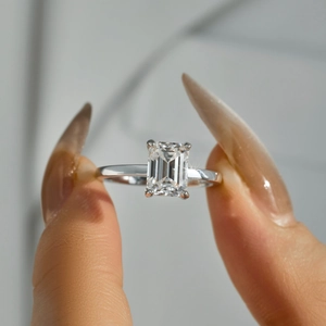 Classic S925 sterling silver ring featuring a 2ct emerald cut moissanite in 4-prong setting