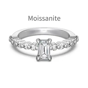 Emerald cut moissanite engagement ring in S925 sterling silver with pavé diamond band
