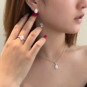 Elegant S925 sterling silver jewelry set featuring teardrop moissanite necklace and earrings