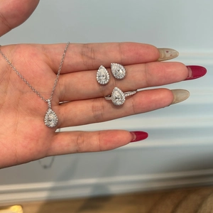 Elegant S925 sterling silver jewelry set with pear-cut moissanite necklace earrings ring