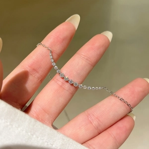 S925 sterling silver smile necklace featuring a row of sparkling moissanite diamonds