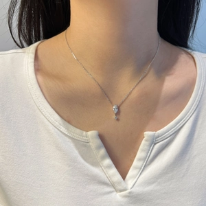 S925 Sterling Silver necklace with Marquise Moissanite pendant worn on model neck