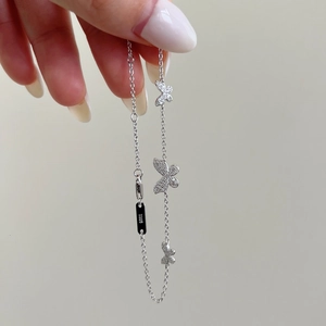 Handheld S925 sterling silver butterfly bracelet featuring sparkling moissanite stones