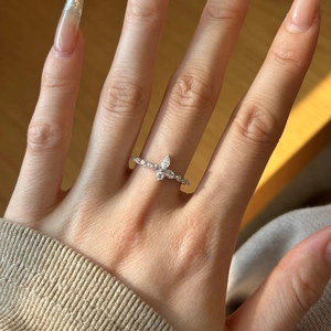Exquisite S925 sterling silver butterfly ring with marquise zircon stones on a hand