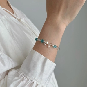 S925 sterling silver ocean bracelet featuring blue crystal beads and starfish charms