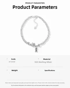 Macro detail of S925 sterling silver smile cat bracelet with cute charms and extension chain