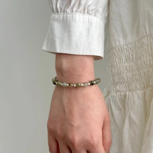 Detail of S925 sterling silver bracelet with green quartz beads and freshwater pearls