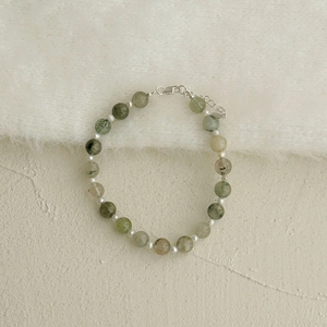 Elegant S925 sterling silver bracelet featuring green rutilated quartz and freshwater pearls